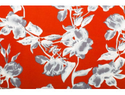 Tissu motif fleur sur fond rouge