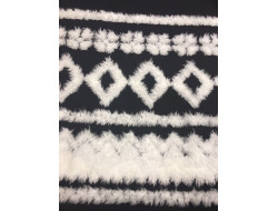 Tissu laine noir décors fourrure blanche
