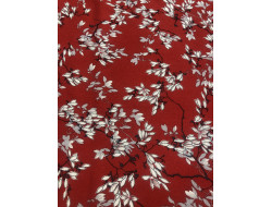 Tissu rouge motif petites fleurs blanches